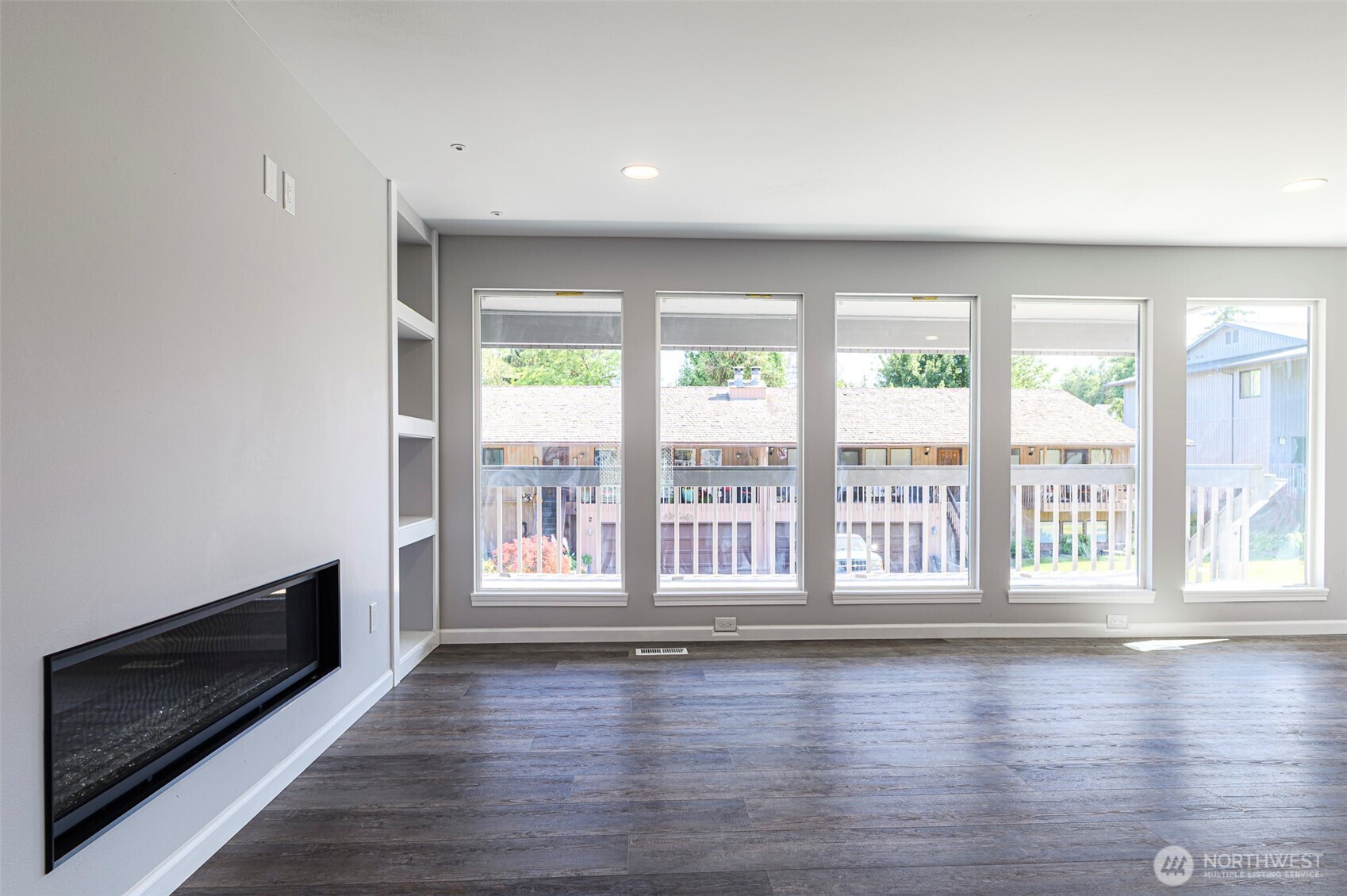 3 Burning Tree Drive, Unit 3 Yakima, WA 98902 - Photo 15 of 32 a view of an empty room with wooden floor and a window