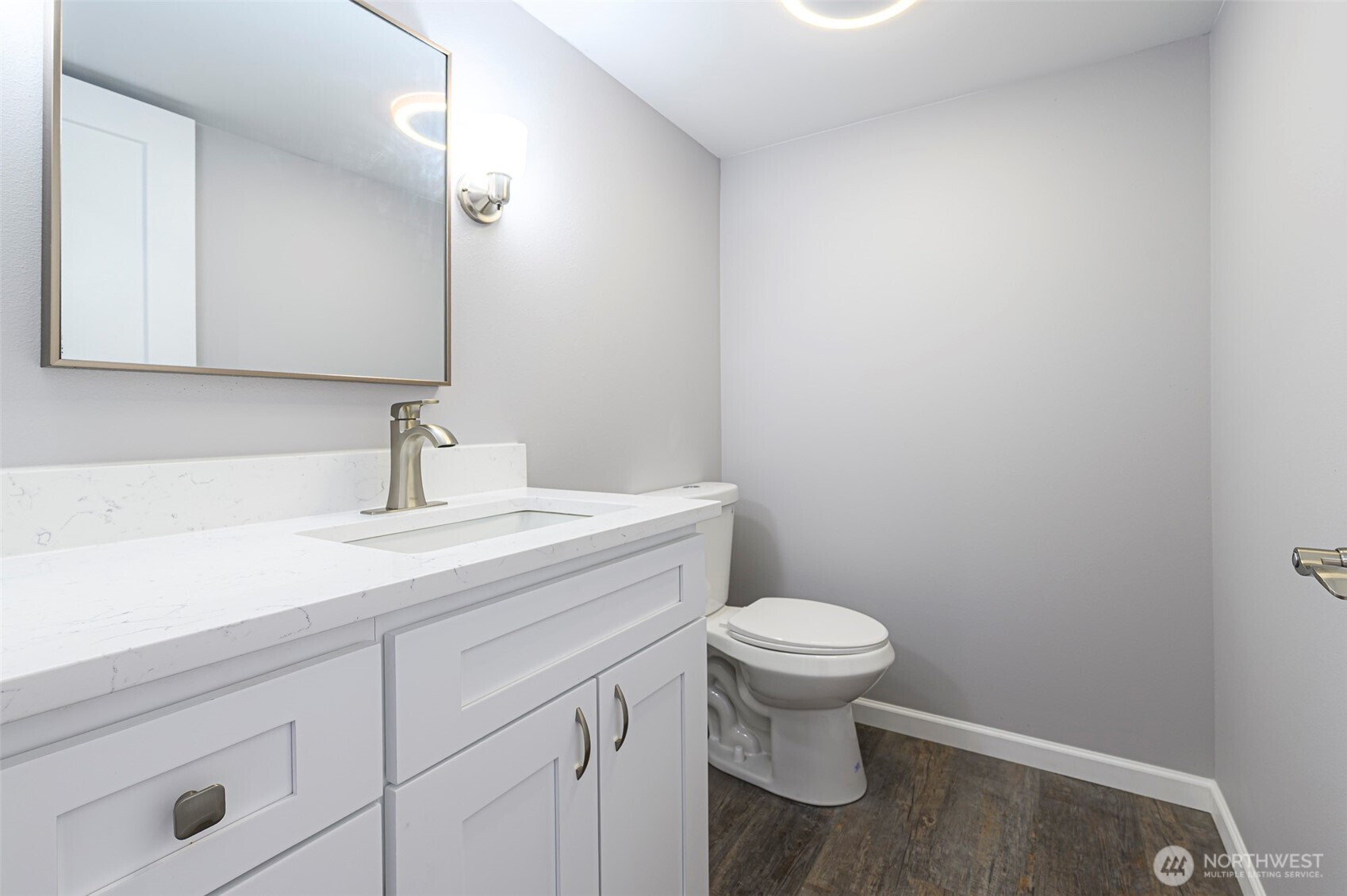 3 Burning Tree Drive, Unit 3 Yakima, WA 98902 - Photo 19 of 32 a bathroom with a sink a toilet and a mirror