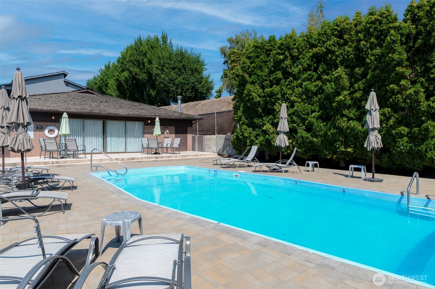 3 Burning Tree Drive, Unit 3 Yakima, WA 98902 - Photo 30 of 32 a view of a house with swimming pool
