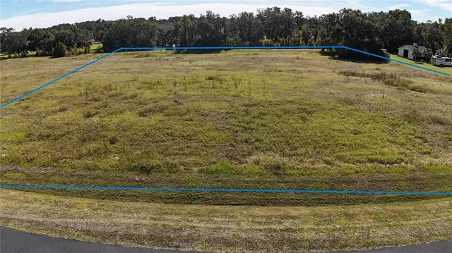 a view of a balcony with two chairs