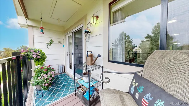 a view of a porch with seating space