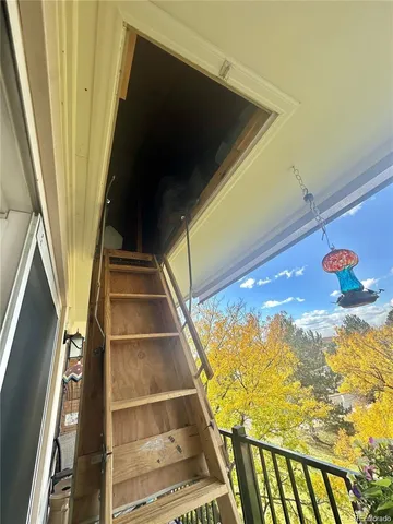 a view of balcony with wooden floor