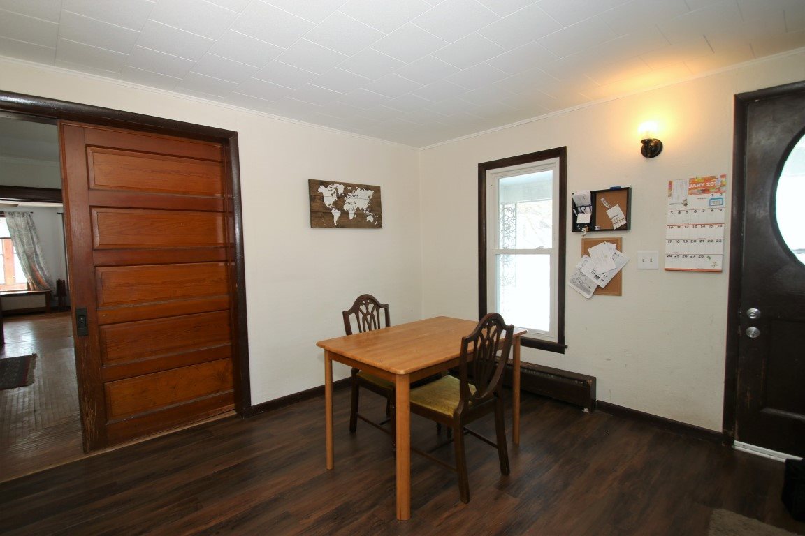 145 4th Street Capron, IL 61012 - Photo 14 of 24 a view of a livingroom with furniture and wooden floor