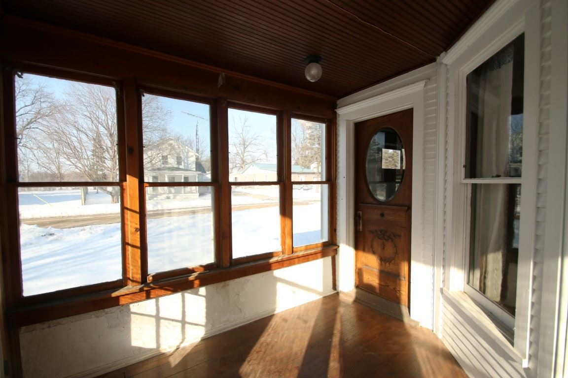 145 4th Street Capron, IL 61012 - Photo 5 of 24 a view of an empty room and window
