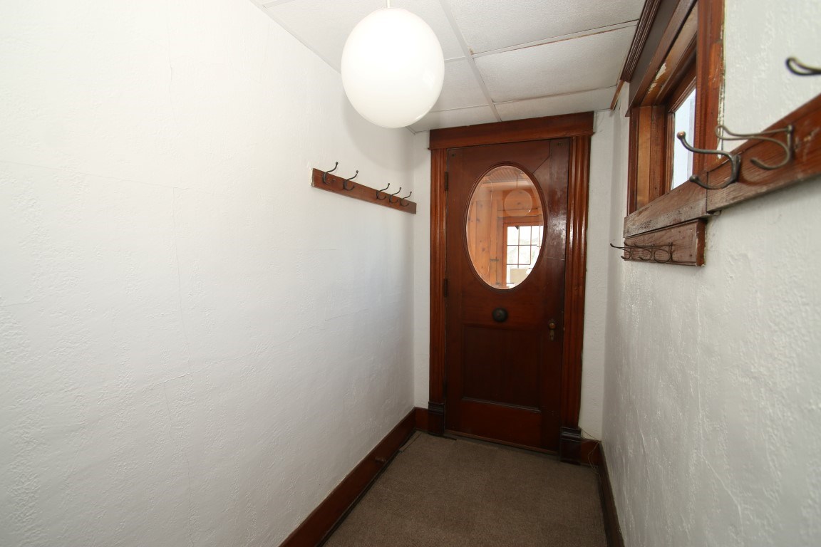 145 4th Street Capron, IL 61012 - Photo 7 of 24 a view of a hallway with wooden floor