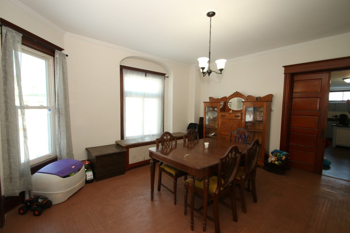 145 4th Street Capron, IL 61012 - Photo 8 of 24 a dining room with furniture and window