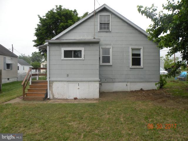 7616 Gum Road Baltimore, MD 21222 - Photo 2 of 5 a view of a house with a yard