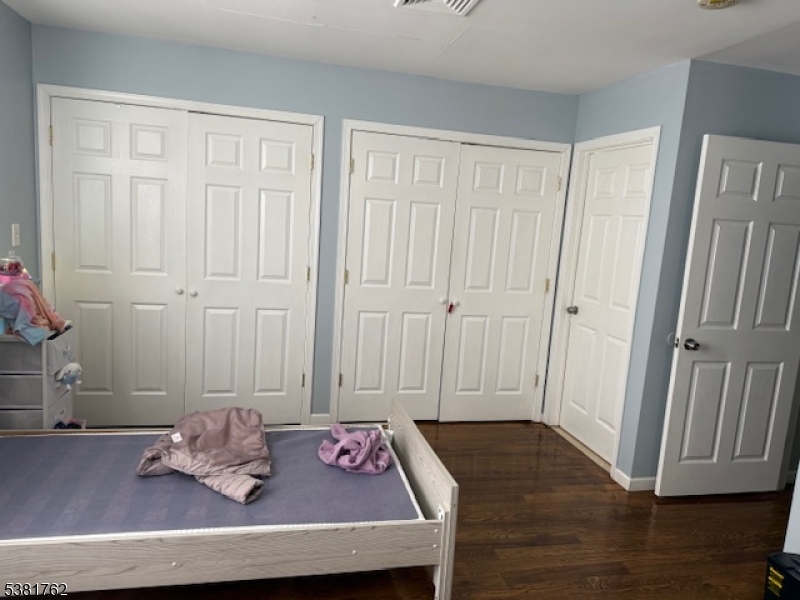 12 Amity Street, Unit 2 Paterson, NJ 07522 - Photo 5 of 14 a view of table and chair