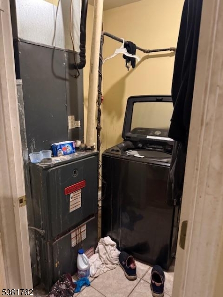 12 Amity Street, Unit 2 Paterson, NJ 07522 - Photo 8 of 14 a utility room with dryer and washer