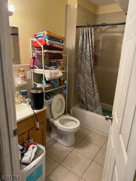 12 Amity Street, Unit 2 Paterson, NJ 07522 - Photo 10 of 14 a bathroom with a sink toilet and shower