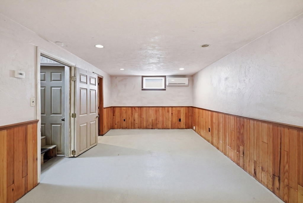 126 Summer Street Boston, MA 02136 - Photo 18 of 28 an empty room with windows