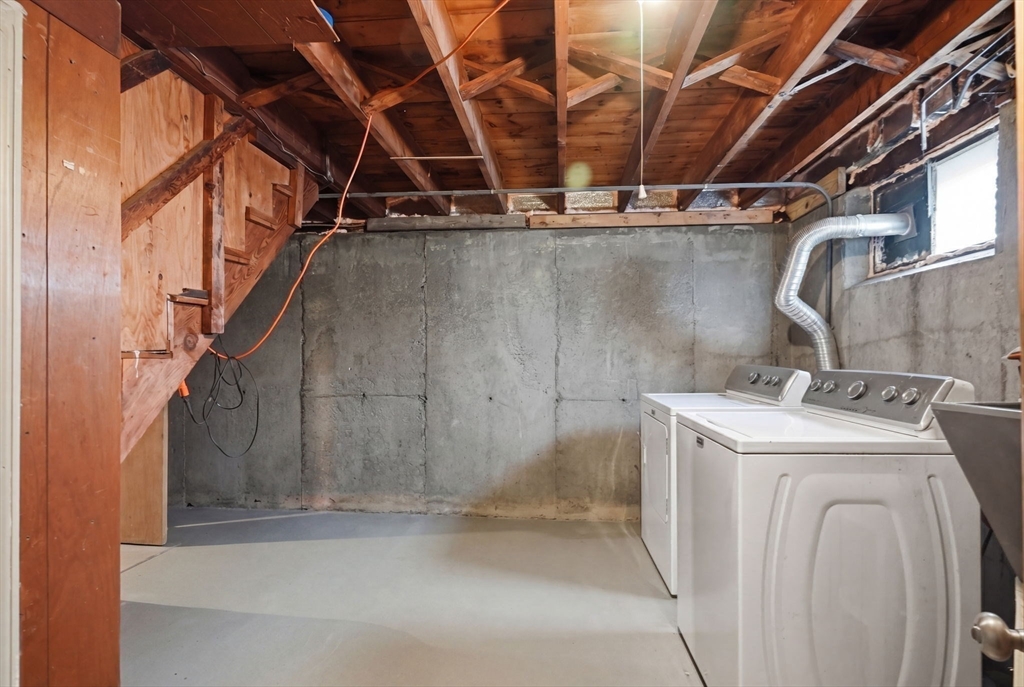 126 Summer Street Boston, MA 02136 - Photo 19 of 28 a utility room with dryer and washer