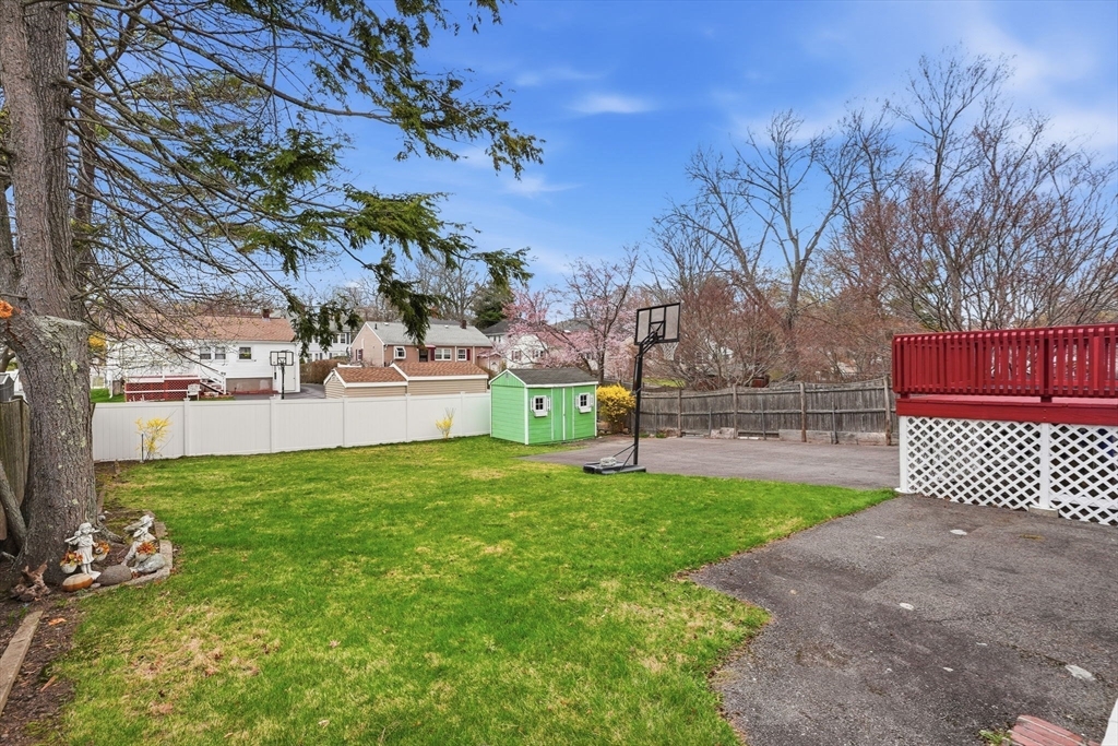 126 Summer Street Boston, MA 02136 - Photo 28 of 28 a view of a backyard with large tree