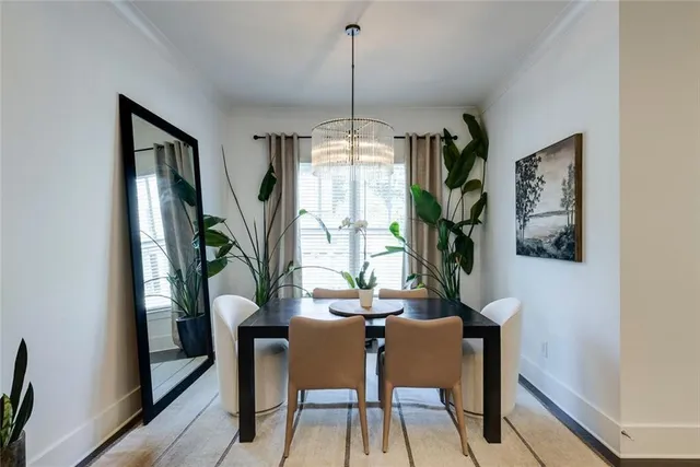 a dining room with furniture window wooden floor