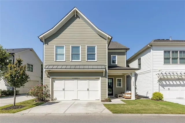a view of living room filled with furniture and window