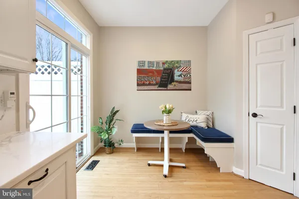 a workspace with furniture and window