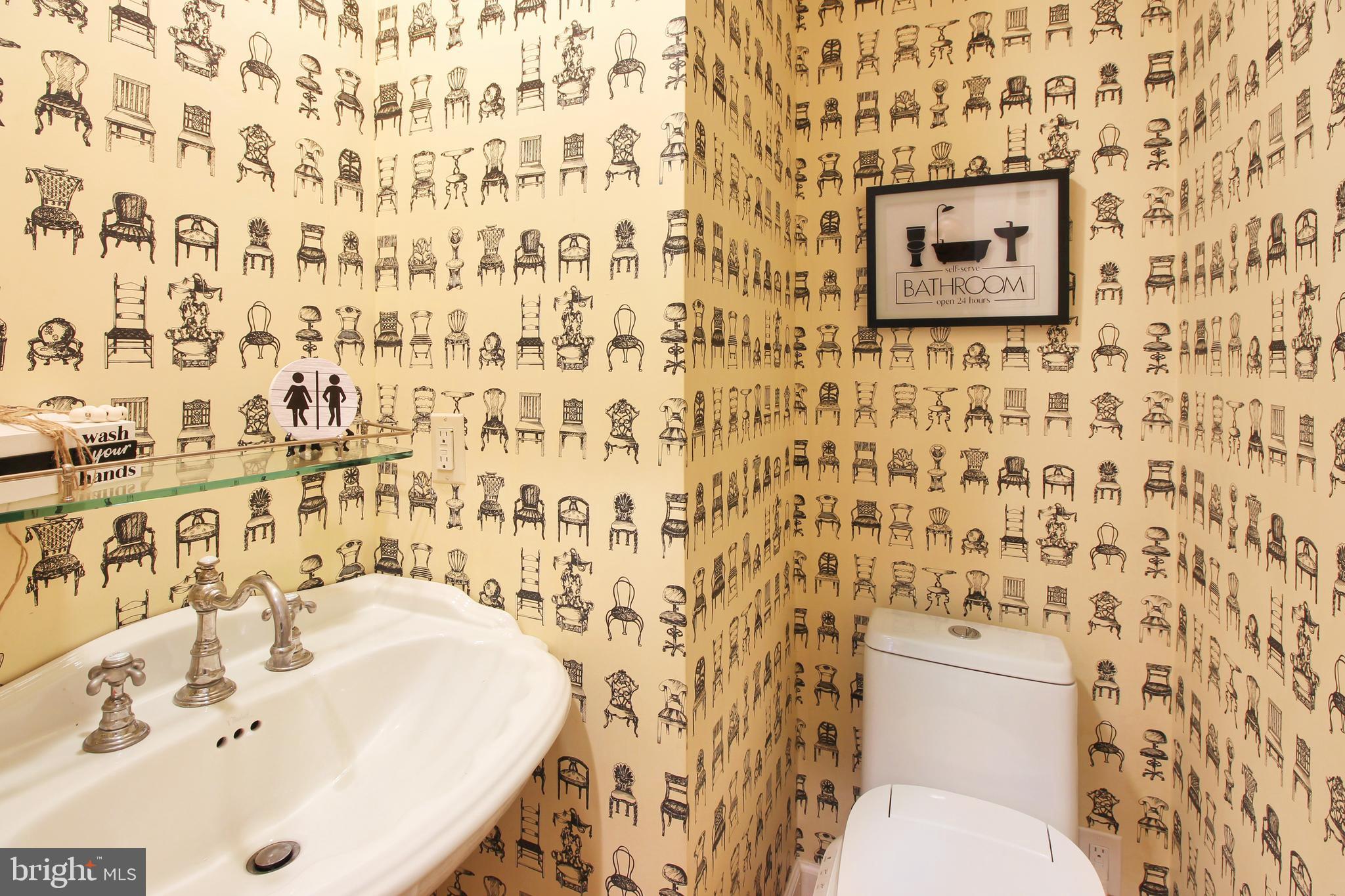 1227 Fidler Lane Silver Spring, MD 20910 - Photo 16 of 33 a bathroom with a sink and a toilet