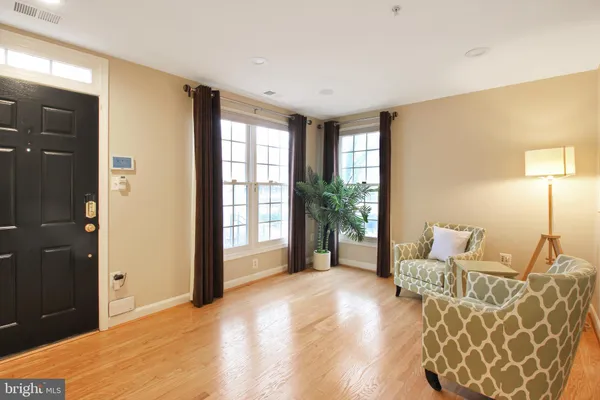 a living room with furniture and window