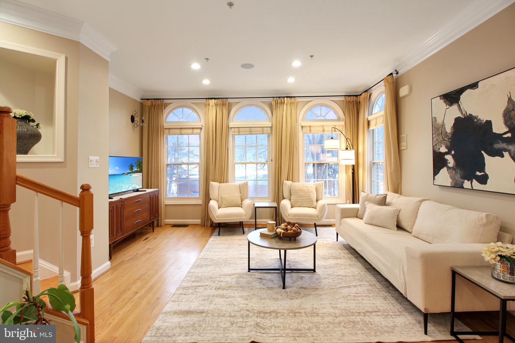 1227 Fidler Lane Silver Spring, MD 20910 - Photo 5 of 33 a living room with furniture and a large window