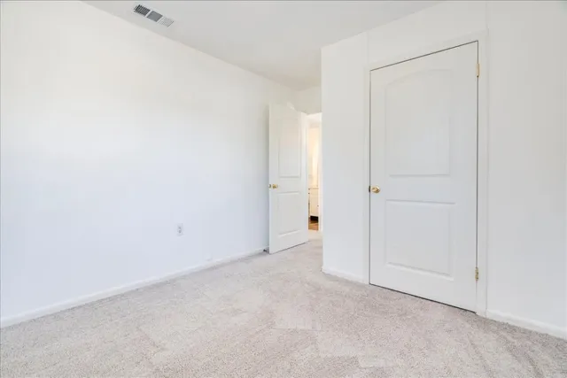 an empty room with closet