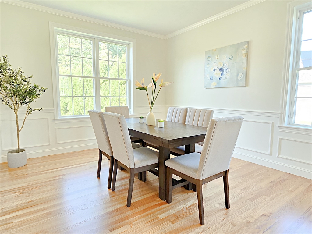 3 Willow Road Ashland, MA 01721 - Photo 12 of 41 a view of a dining room with furniture window and wooden floor