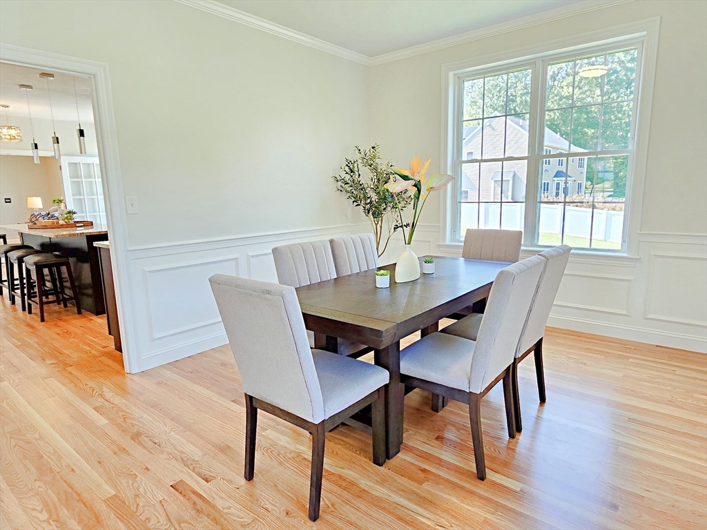 3 Willow Road Ashland, MA 01721 - Photo 13 of 41 a view of a dining room with furniture window and wooden floor