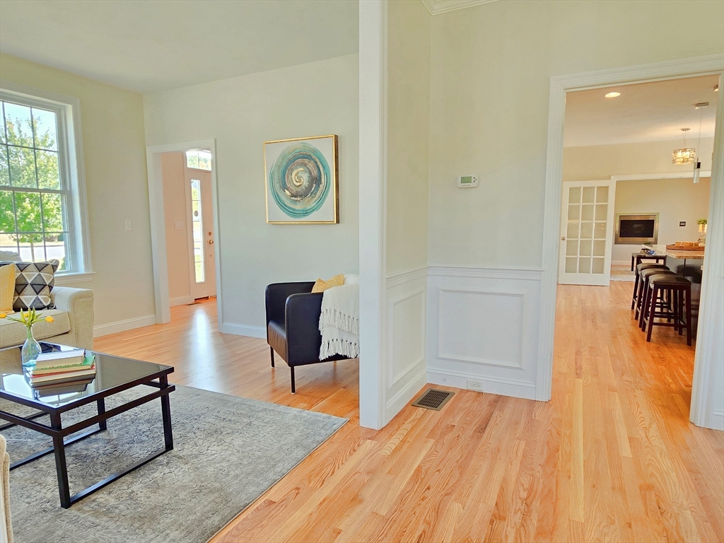 3 Willow Road Ashland, MA 01721 - Photo 14 of 41 a living room with furniture and a wooden floor