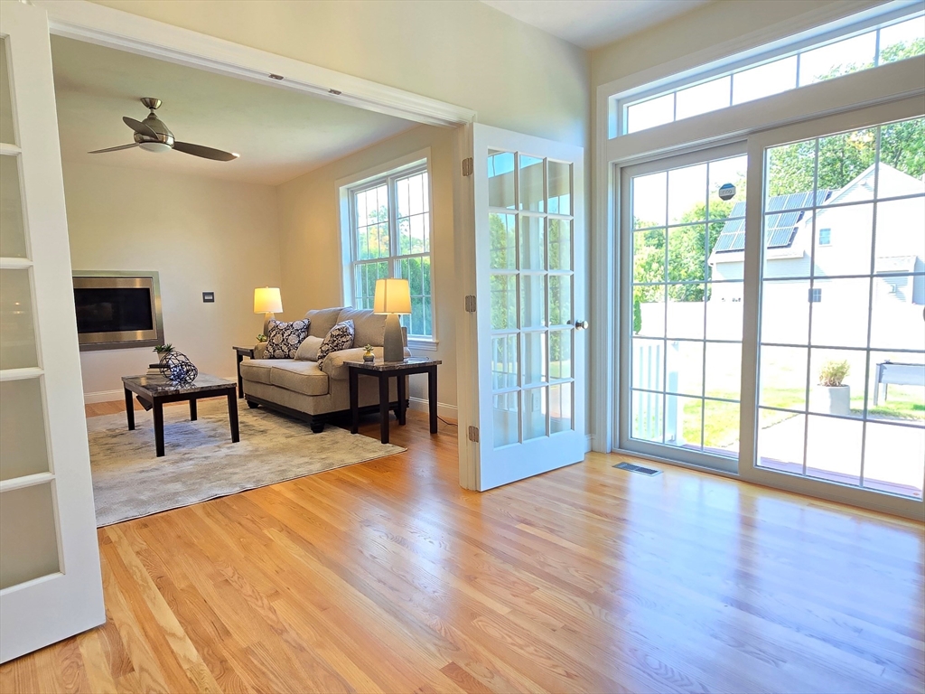 3 Willow Road Ashland, MA 01721 - Photo 23 of 41 a living room with furniture and a wooden floor