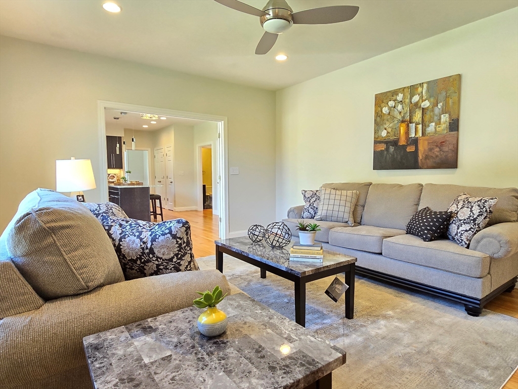 3 Willow Road Ashland, MA 01721 - Photo 28 of 41 a living room with furniture and a table