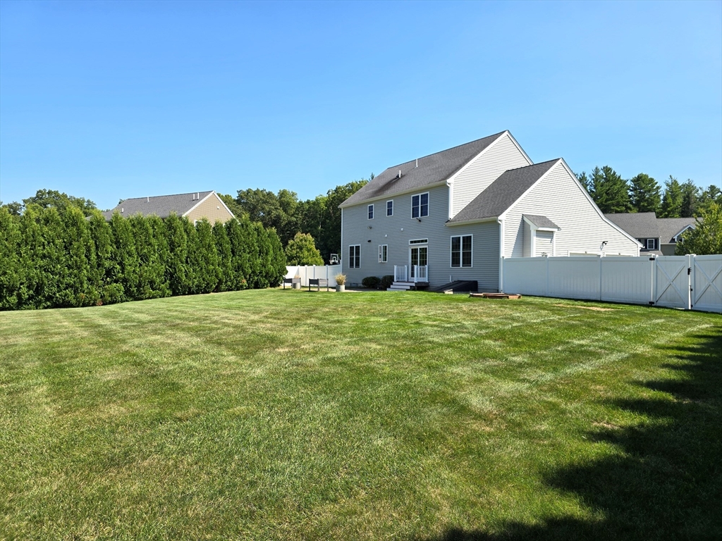 3 Willow Road Ashland, MA 01721 - Photo 3 of 41 a front view of house with yard and green space