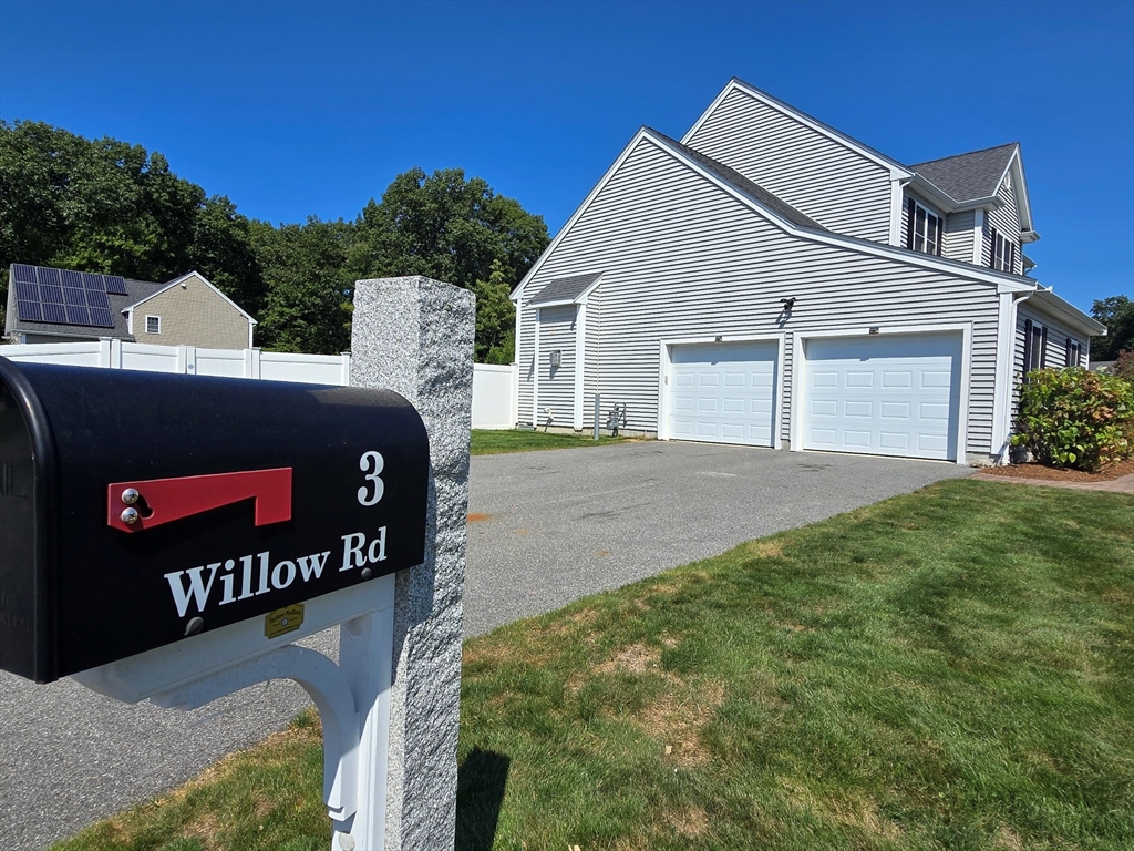 3 Willow Road Ashland, MA 01721 - Photo 5 of 41 a view of a house with a yard
