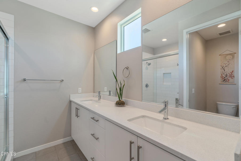 1553 Verbena Way Los Angeles, CA 90041 - Photo 21 of 31 a bathroom with a sink and a mirror