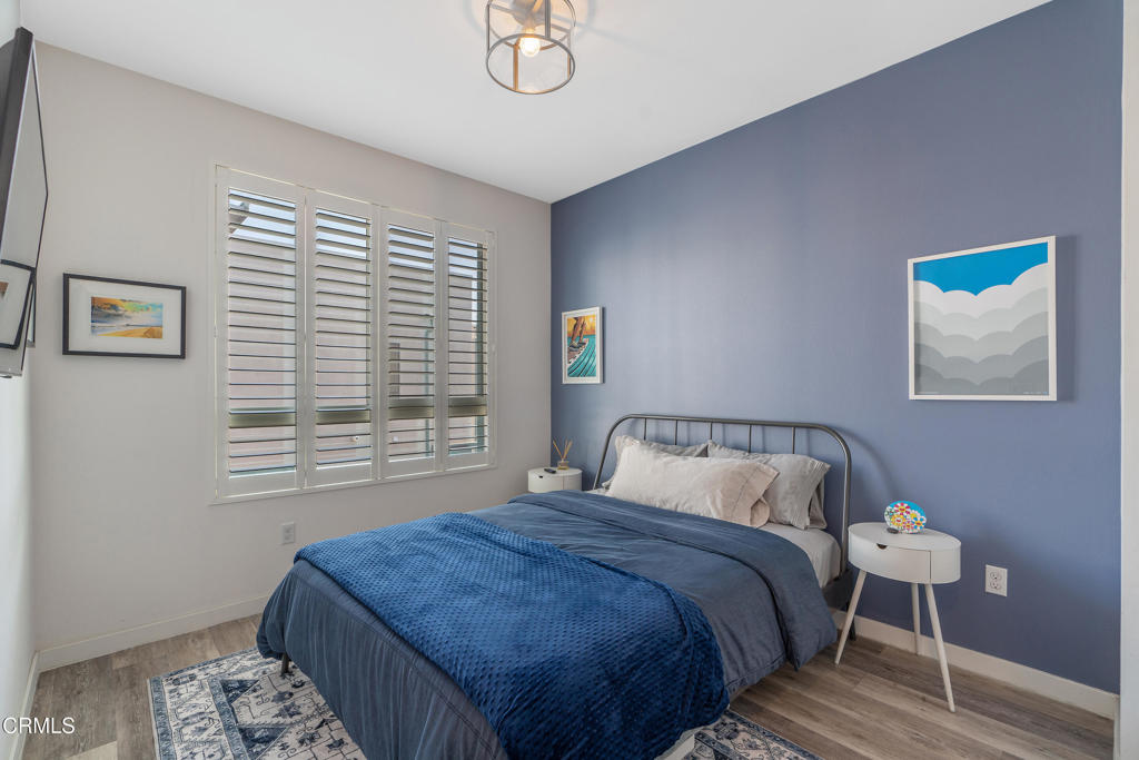 1553 Verbena Way Los Angeles, CA 90041 - Photo 25 of 31 a bedroom with a bed and a window