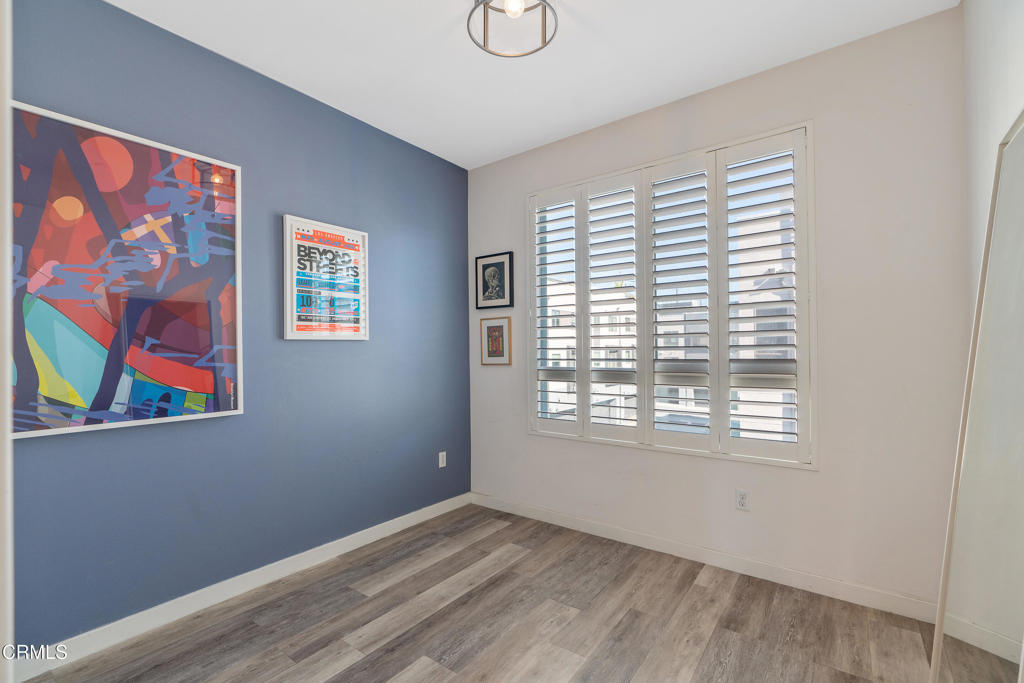 1553 Verbena Way Los Angeles, CA 90041 - Photo 27 of 31 a view of an empty room with window and wooden floor