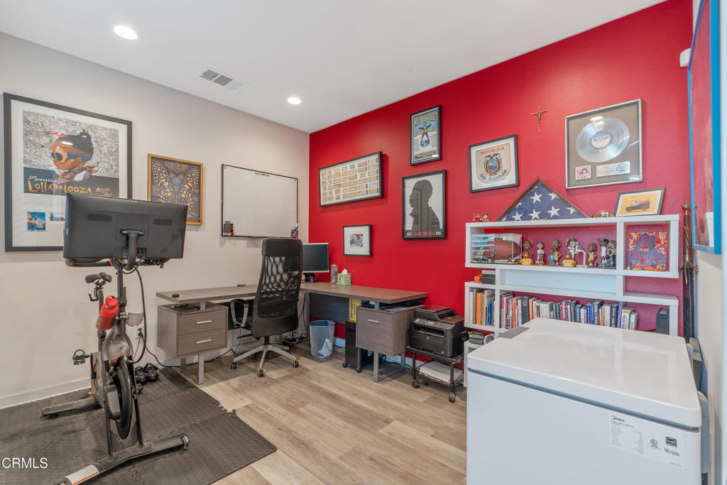 1553 Verbena Way Los Angeles, CA 90041 - Photo 3 of 31 a living room with furniture and a flat screen tv