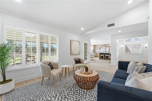 a living room with furniture and a table