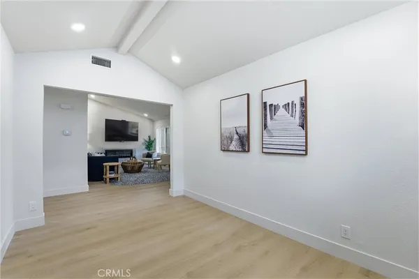 a view of livingroom with furniture and a flat screen tv