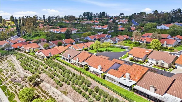 an aerial view of a pool patio swimming pool and outdoor seating