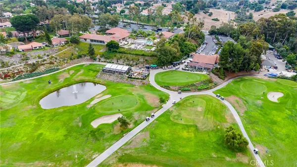 an aerial view of a house with a garden