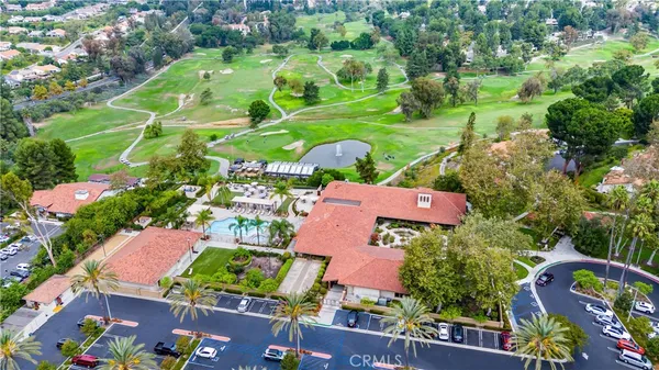 an aerial view of a yard with plants and flowers