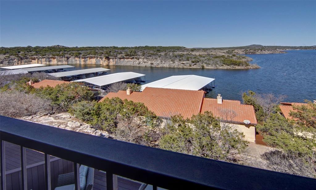 3109 Hells Gate Loop, Unit 59 Strawn, TX 76475 - Photo 11 of 25 a view of a city from a terrace