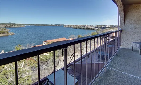a view of balcony with city