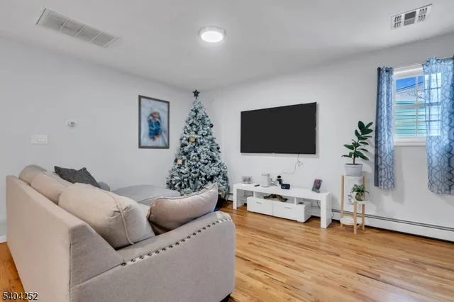 a view of a patio with table and chairs