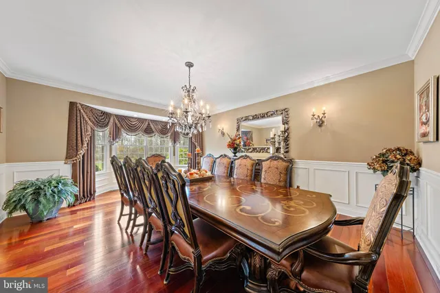 a kitchen with stainless steel appliances granite countertop a stove and a refrigerator