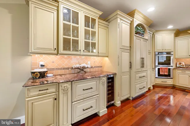 a view of living room with furniture and fireplace