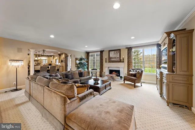 a bathroom with a granite countertop sink a toilet and a mirror