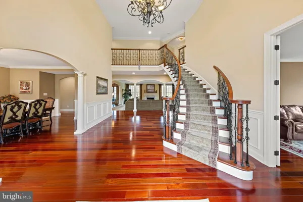 a view of entryway with wooden floor