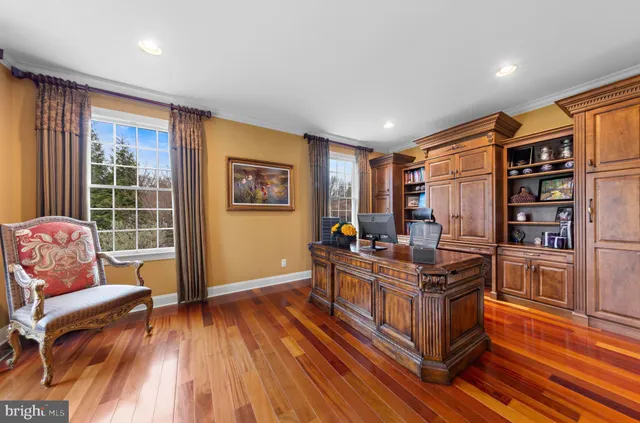 a view of workspace with furniture and window