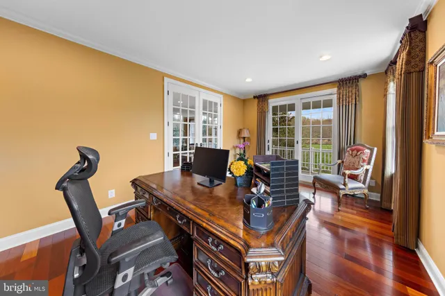 a view of a livingroom with furniture and staircase