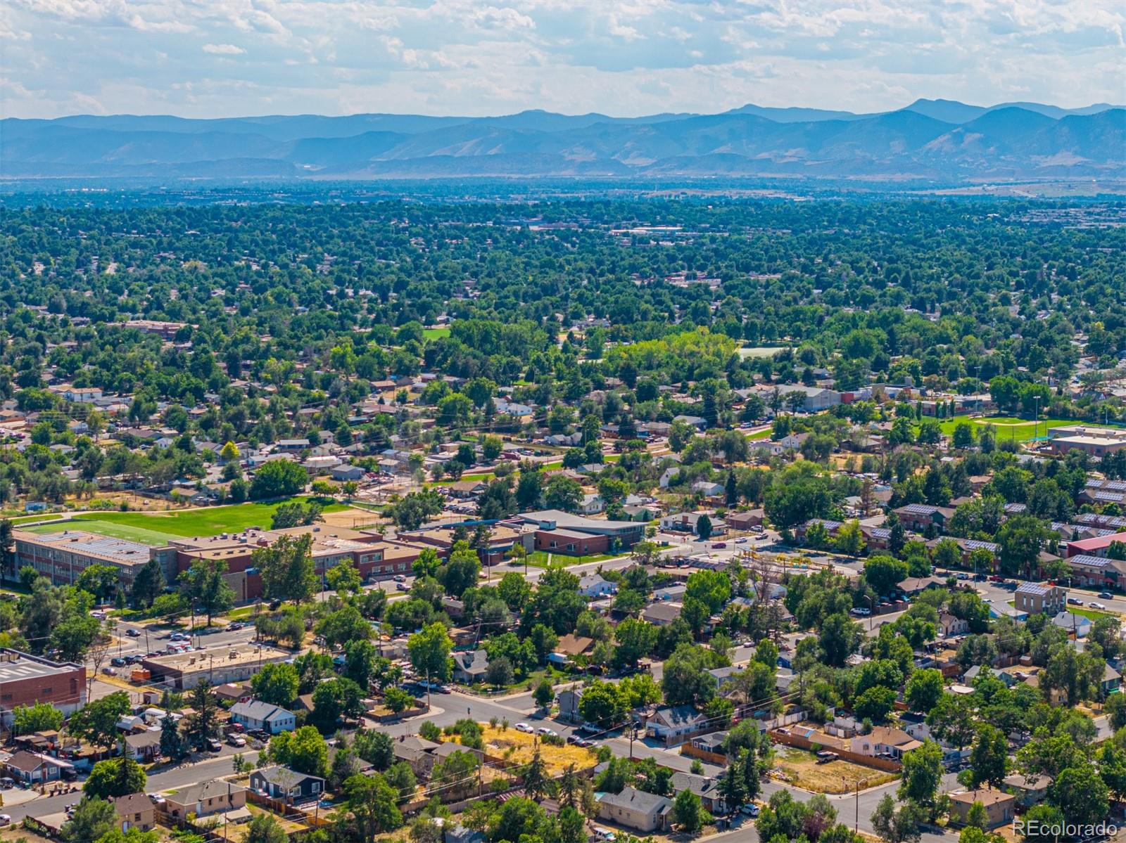 3145 West Ada Place Denver, CO 80219 - Photo 15 of 19 a view of a city with a lake